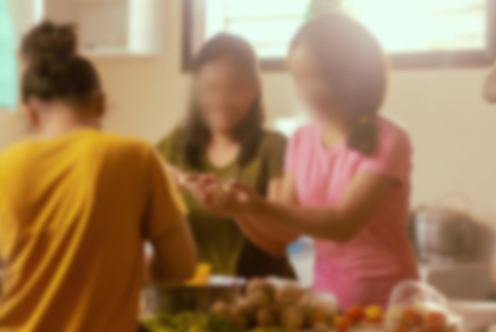 Survivors at shelter, blurred to protect identity